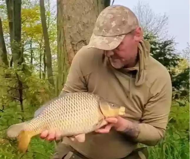Holding  A nice Common Carp For The Camera
